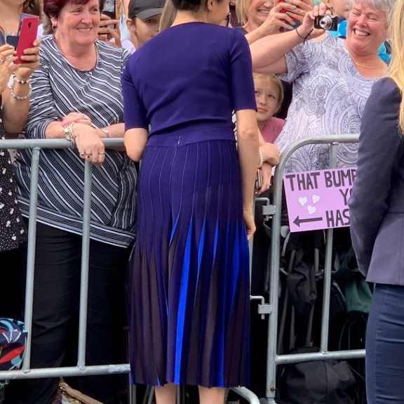 meghan markle pleated periwinkle dress Meghan Markle stuns a in a slew of looks in the trailer for her new Netflix  show 'With Love, Meghan'including a pleated periwinkle blue dress that's  the sartorial opposite of her royal