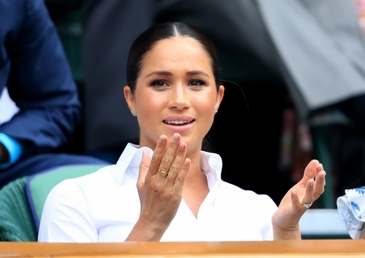The Duchess of Sussex on day twelve of the Wimbledon Championships at the All England Lawn Tennis and Croquet Club, Wimbledon.