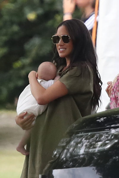 The Duchess of Sussex holding her son Archie as they attend the King Power Royal Charity Polo Day at Billingbear Polo Club, Wokingham, Berkshire.