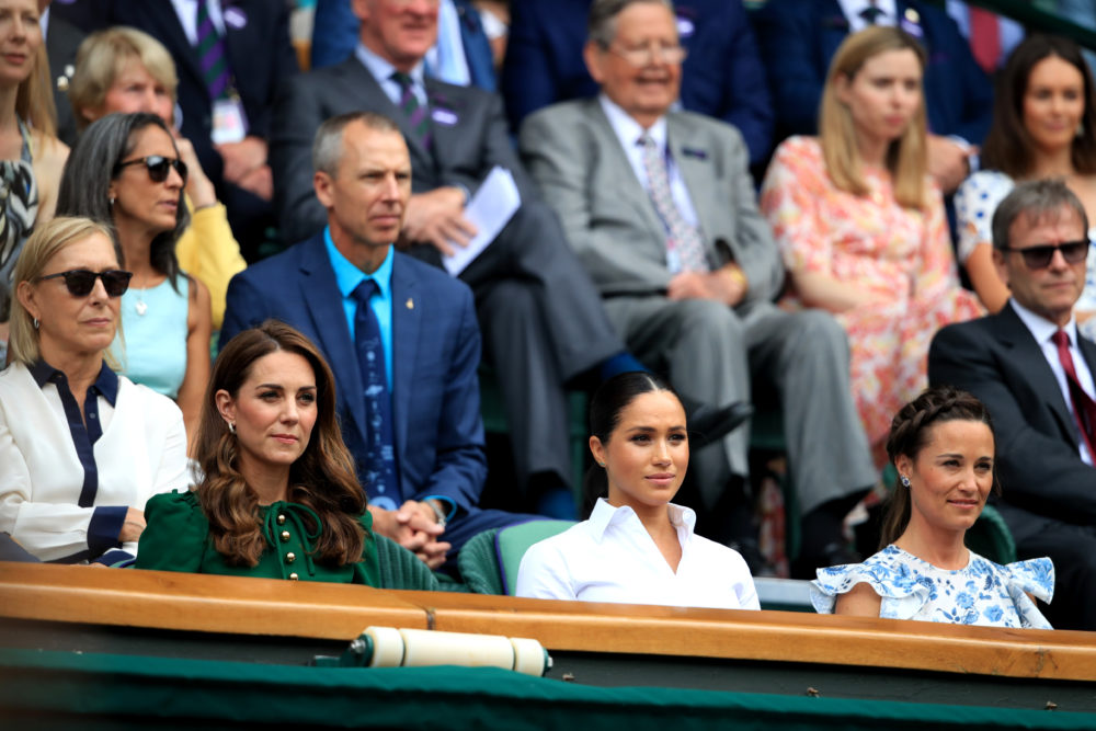The Duchess of Cambridge and The Duchess of Sussex with Pippa Matthews on day twelve of the Wimbledon Championships at the All England Lawn Tennis and Croquet Club, Wimbledon.