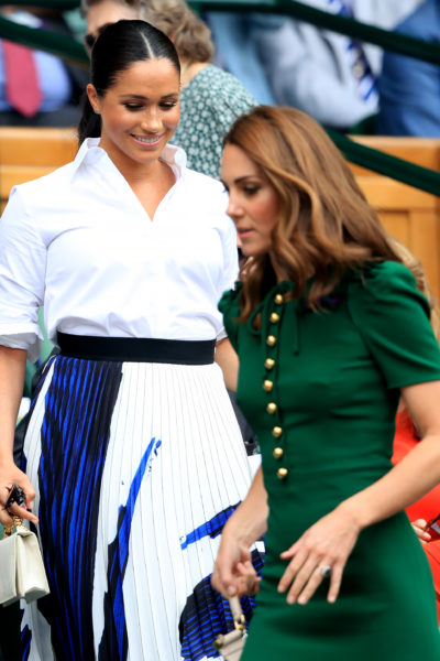 The Duchess of Cambridge and The Duchess of Sussex on day twelve of the Wimbledon Championships at the All England Lawn Tennis and Croquet Club, Wimbledon.